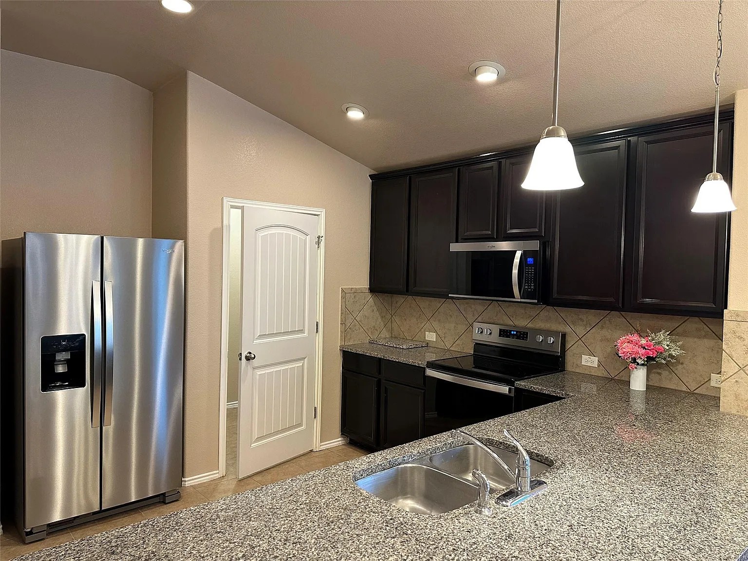 Kitchen at 19013 Mangan Way in Pflugerville, Texas